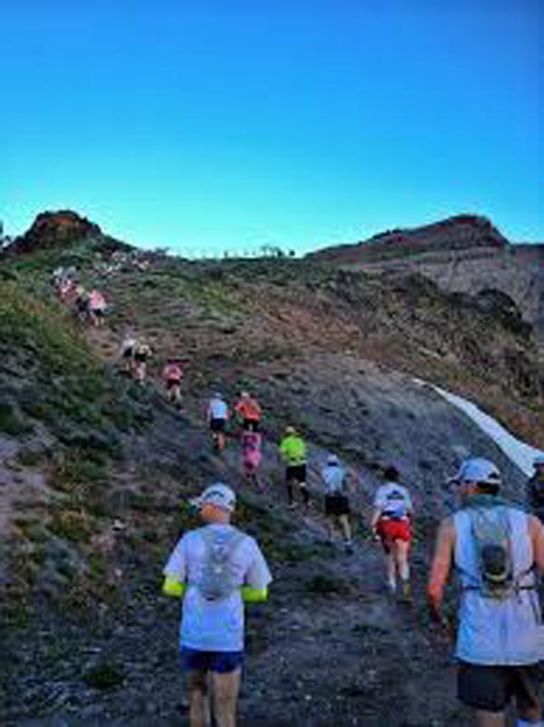 Runners climbing Escarpment